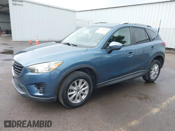 ✅ 2016 Mazda CX-5 Touring • VIN: JM3KE2CY0G0752015 • Lot: 43774015. Wystawiony na IAAI z przebiegiem 150 233 mil. Bezpłatny archiwum sprzedaży aukcyjnych z USA i szczegółowy raport historii pojazdu na DreamBid. Zdjęcie 18.
