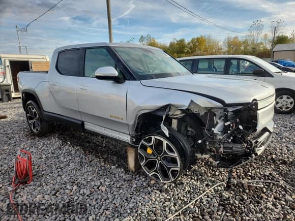 ✅ 2022 Rivian R1T Adventure • VIN: 7FCTGAAA9NN008835 • Lot: 89806565. Listed on Copart with 14,873 mi. Free auction sales archive from the USA and detailed vehicle history report at DreamBid. Image 4.