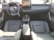 ✅ 2026 Toyota Corolla Cross XLE • VIN: 7MUDAABG0TV150339 • Лот: 91928275. Опубликован ранее на Copart с пробегом 1 034 миль. Бесплатный доступ к архиву аукционных продаж из США и подробный отчёт об истории автомобиля на DreamBid. Изображение 8.