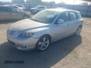 ✅ 2005 Mazda 3 s • VIN: JM1BK143751256585 • Lot: 43694670. Listed on IAAI with 59,822 mi. Free auction sales archive from the USA and detailed vehicle history report at DreamBid. Image 2.