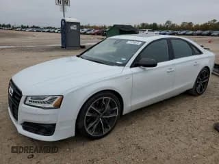 ✅ 2017 Audi S8 • VIN: WUAJ5AFD8HN901401 • Lot: 77734973. Wystawiony na Copart z przebiegiem 133 780 mil. Bezpłatny archiwum sprzedaży aukcyjnych z USA i szczegółowy raport historii pojazdu na DreamBid. Zdjęcie 1.