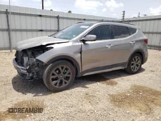 ✅ 2018 Hyundai Santa Fe Ultimate • VIN: 5NMZW4LA6JH077507 • Лот: 61937343. Опубликован ранее на Copart с пробегом 74 278 миль. Бесплатный доступ к архиву аукционных продаж из США и подробный отчёт об истории автомобиля на DreamBid. Изображение 1.