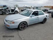 ✅ 1995 Toyota Camry LE • VIN: JT2GK12E7S0111308 • Lot: 66548415. Wystawiony na Copart z przebiegiem 237 050 mil. Bezpłatny archiwum sprzedaży aukcyjnych z USA i szczegółowy raport historii pojazdu na DreamBid. Zdjęcie 1.