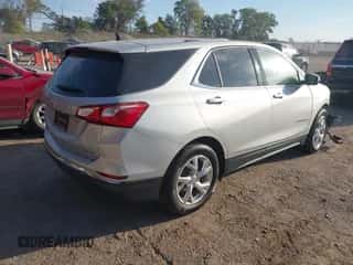 2019 Chevrolet Equinox LT z VIN 3GNAXUEV1KL319707, wystawiony jako IAAI lot #43344734 z przebiegiem 57 212 mil mil oraz . Historia ofert i sprzedaży dostępna na DreamBid. Obrazek 4.