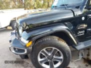 ✅ 2021 Jeep Wrangler Unlimited Sahara Altitude • VIN: 1C4HJXEG9MW511207 • Lot: 43605598. Listed on IAAI with 120,073 mi. Free auction sales archive from the USA and detailed vehicle history report at DreamBid. Image 17.