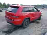 2021 Jeep Grand Cherokee Trailhawk with VIN 1C4RJFLGXMC579888, listed as a IAAI auction lot 42951354 with 76,948 mi miles and . Bid and sale history available at DreamBid. Image 4.