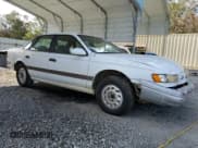 ✅ 1992 Ford Taurus GL • VIN: 1FALP52U5NA280821 • Lot: 77457304. Listed on Copart with 33,484 mi. Free auction sales archive from the USA and detailed vehicle history report at DreamBid. Image 4.