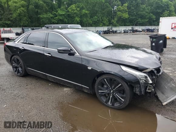 ✅ 2016 Cadillac CT6 Platinum AWD • VIN: 1G6KK5R61GU164838 • Лот: 54346515. Опубликован ранее на Copart с пробегом 130 272 миль. Бесплатный доступ к архиву аукционных продаж из США и подробный отчёт об истории автомобиля на DreamBid. Изображение 4.