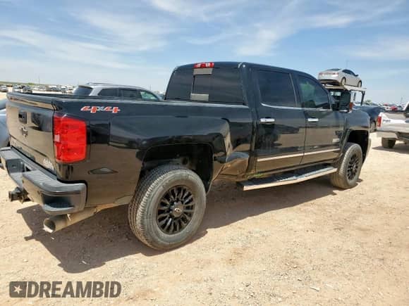 2017 Chevrolet Silverado 2500HD High Country с VIN 1GC1KXEY4HF160087, выставлен на аукционе Copart как лот 57040825 с пробегом 86 926 миль миль и Списание • Salvage title. История ставок и продаж доступна на DreamBid. Изображение 3.