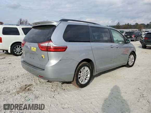 ✅ 2015 Toyota Sienna XLE • VIN: 5TDYK3DC5FS543899 • Lot: 93350755. Listed on Copart with 157,379 mi. Free auction sales archive from the USA and detailed vehicle history report at DreamBid. Image 3.
