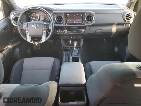 ✅ 2023 Toyota Tacoma SR • VIN: 3TMCZ5AN2PM564332 • Lot: 56237625. Listed on Copart with 82,789 mi. Free auction sales archive from the USA and detailed vehicle history report at DreamBid. Image 8.