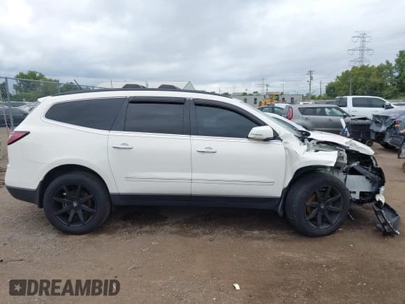 ✅ 2014 Chevrolet Traverse LTZ • VIN: 1GNKRJKD4EJ359381 • Lot: 43045392. Listed on IAAI with 186,015 mi. Free auction sales archive from the USA and detailed vehicle history report at DreamBid. Image 13.