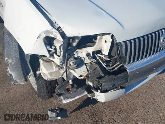 2006 Mercury Mariner Luxury z VIN 4M2YU571X6DJ04235, wystawiony jako IAAI lot #41631062 z przebiegiem 290 925 mil mil oraz . Historia ofert i sprzedaży dostępna na DreamBid. Obrazek 6.