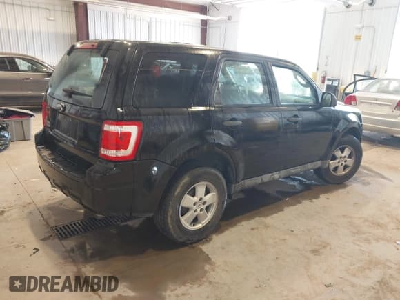 ✅ 2009 Ford Escape XLS • VIN: 1FMCU027X9KC99165 • Lot: 42565928. Listed on IAAI with 179,177 mi. Free auction sales archive from the USA and detailed vehicle history report at DreamBid. Image 4.