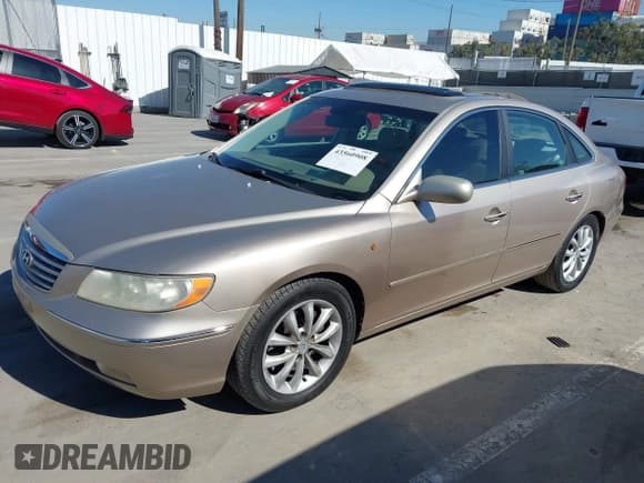 ✅ 2006 Hyundai Azera SE • VIN: KMHFC46F66A124356 • Lot: 43560908. Listed on IAAI with 155,569 mi. Free auction sales archive from the USA and detailed vehicle history report at DreamBid. Image 2.