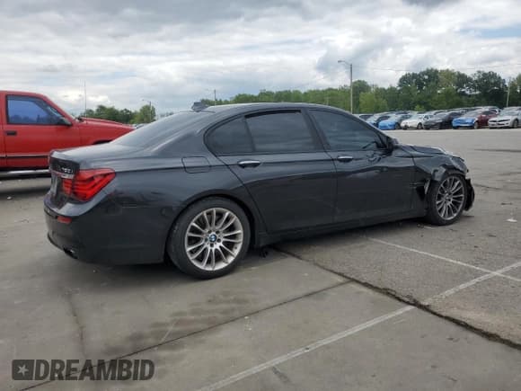 ✅ 2015 BMW 7 Series 750i xDrive • VIN: WBAYB6C59FD965977 • Лот: 69742525. Опубликован ранее на Copart с пробегом 83 623 миль. Бесплатный доступ к архиву аукционных продаж из США и подробный отчёт об истории автомобиля на DreamBid. Изображение 3.