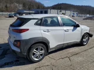 ✅ 2019 Hyundai Kona SE • VIN: KM8K1CAA8KU369601 • Лот: 43670214. Опубликован ранее на Copart с пробегом 76 541 миль. Бесплатный доступ к архиву аукционных продаж из США и подробный отчёт об истории автомобиля на DreamBid. Изображение 3.
