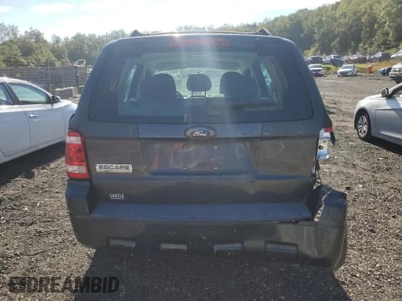 ✅ 2009 Ford Escape XLS • VIN: 1FMCU02789KC80906 • Lot: 84623545. Listed on Copart with 141,224 mi. Free auction sales archive from the USA and detailed vehicle history report at DreamBid. Image 6.