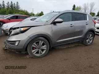 ✅ 2014 Kia Sportage SX • VIN: KNDPCCA67E7584129 • Лот: 58516515. Опубликован ранее на Copart с пробегом 181 826 миль. Бесплатный доступ к архиву аукционных продаж из США и подробный отчёт об истории автомобиля на DreamBid. Изображение 1.