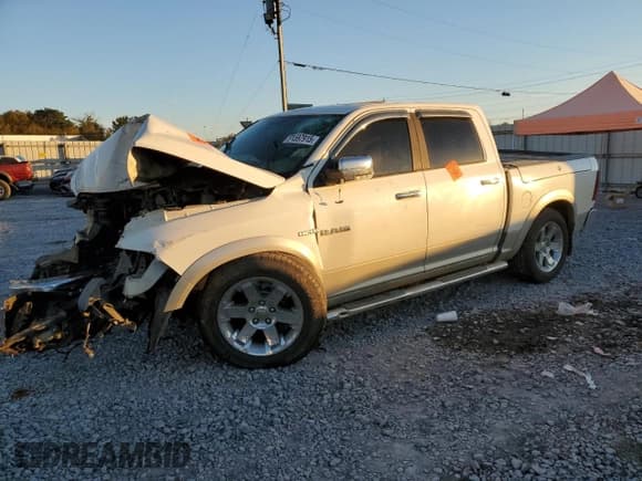 ✅ 2009 Dodge 1500 Laramie • VIN: 1D3HV13T49J530308 • Lot: 91597915. Listed on Copart with Not provided. Free auction sales archive from the USA and detailed vehicle history report at DreamBid. Image 1.