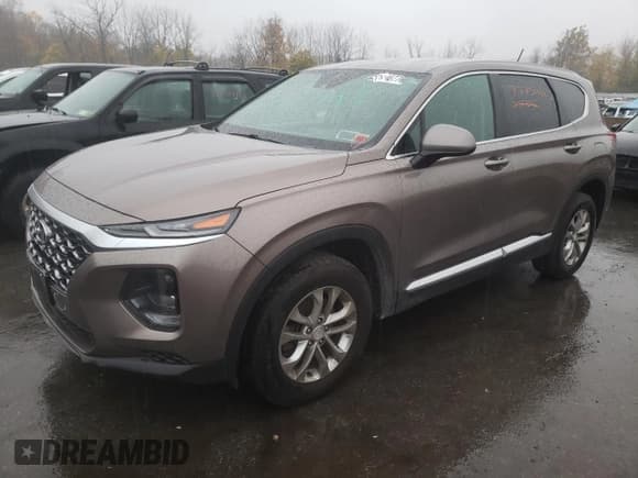 ✅ 2019 Hyundai Santa Fe SE • VIN: 5NMS2CAD1KH128322 • Lot: 73730493. Wystawiony na Copart z przebiegiem 41 785 mil. Bezpłatny archiwum sprzedaży aukcyjnych z USA i szczegółowy raport historii pojazdu na DreamBid. Zdjęcie 1.