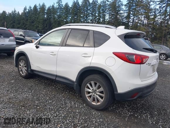 ✅ 2014 Mazda CX-5 Touring • VIN: JM3KE4CY5E0398632 • Lot: 43514791. Listed on IAAI with 204,895 mi. Free auction sales archive from the USA and detailed vehicle history report at DreamBid. Image 3.