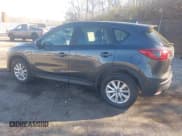 ✅ 2015 Mazda CX-5 Sport • VIN: JM3KE4BY6F0499357 • Lot: 43817789. Listed on IAAI with 155,042 mi. Free auction sales archive from the USA and detailed vehicle history report at DreamBid. Image 3.