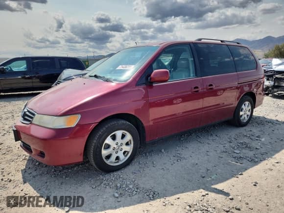 ✅ 2004 Honda Odyssey EX-RES • VIN: 5FNRL18844B099248 • Lot: 71436225. Listed on Copart with 176,042 mi. Free auction sales archive from the USA and detailed vehicle history report at DreamBid. Image 1.