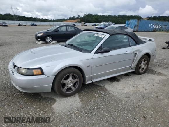 ✅ 2004 Ford Mustang Deluxe • VIN: 1FAFP44494F117692 • Lot: 56503755. Listed on Copart with 159,917 mi. Free auction sales archive from the USA and detailed vehicle history report at DreamBid. Image 1.