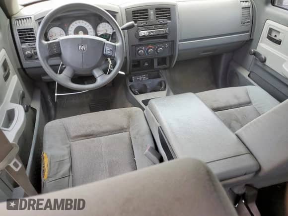 2005 Dodge Dakota ST с VIN 1D7HE28K35S235225, выставлен на аукционе Copart как лот 57684725 с пробегом 184 546 миль миль и Списание • Salvage title. История ставок и продаж доступна на DreamBid. Изображение 8.