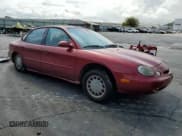✅ 1997 Ford Taurus LX • VIN: 1FALP53S1VG148018 • Lot: 67036654. Listed on Copart with 166,162 mi. Free auction sales archive from the USA and detailed vehicle history report at DreamBid. Image 4.