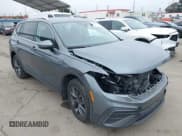 ✅ 2023 Volkswagen Tiguan SE • VIN: 3VV3B7AX0PM130980 • Lot: 42158302. Wystawiony na IAAI z przebiegiem 30 653 mil. Bezpłatny archiwum sprzedaży aukcyjnych z USA i szczegółowy raport historii pojazdu na DreamBid. Zdjęcie 1.