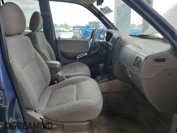 ✅ 2002 Kia Sportage • VIN: KNDJB723725162910 • Lot: 63429425. Wystawiony na Copart z przebiegiem 217 051 mil. Bezpłatny archiwum sprzedaży aukcyjnych z USA i szczegółowy raport historii pojazdu na DreamBid. Zdjęcie 7.