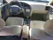 2002 Hyundai Elantra GLS z VIN KMHDN45D12U366014, wystawiony jako Copart lot #80770854 z przebiegiem 126 783 mil mil oraz Czysty tytuł • Clean title. Historia ofert i sprzedaży dostępna na DreamBid. Obrazek 8.