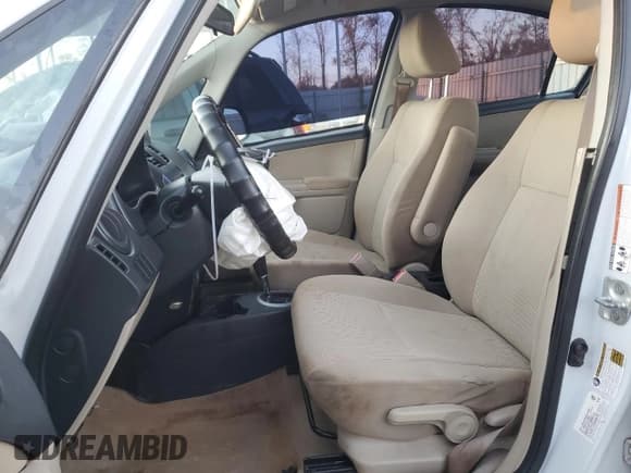 ✅ 2010 Suzuki SX4 LE • VIN: JS2YC5A24A6301771 • Lot: 83049774. Wystawiony na Copart z przebiegiem 165 033 mil. Bezpłatny archiwum sprzedaży aukcyjnych z USA i szczegółowy raport historii pojazdu na DreamBid. Zdjęcie 7.