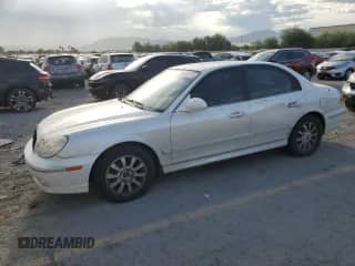 2004 Hyundai Sonata GLS with VIN KMHWF35H64A016742, listed as a Copart auction lot 70061115 with 157,570 mi miles and Salvage title. Bid and sale history available at DreamBid. Image 1.