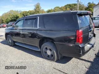✅ 2015 Chevrolet Suburban LTZ • VIN: 1GNSKKKC7FR125739 • Lot: 75875474. Wystawiony na Copart z przebiegiem 176 287 mil. Bezpłatny archiwum sprzedaży aukcyjnych z USA i szczegółowy raport historii pojazdu na DreamBid. Zdjęcie 2.