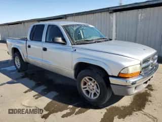2004 Dodge Dakota SLT z VIN 1D7HL48N54S750432, wystawiony jako Copart lot #78485624 z przebiegiem 139 073 mil mil oraz Czysty tytuł • Clean title. Historia ofert i sprzedaży dostępna na DreamBid. Obrazek 4.