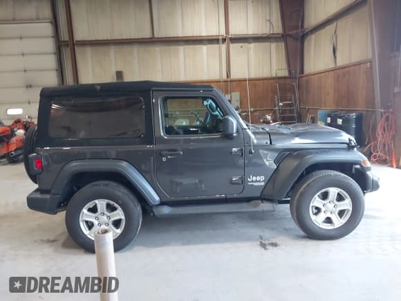 ✅ 2020 Jeep Wrangler Sport S • VIN: 1C4GJXAN6LW157127 • Lot: 43132606. Listed on IAAI with 14,778 mi. Free auction sales archive from the USA and detailed vehicle history report at DreamBid. Image 13.