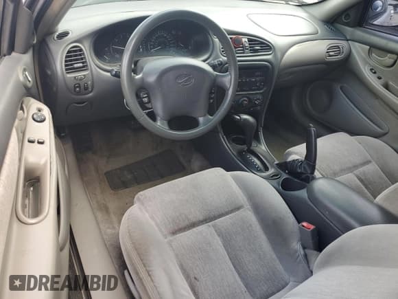 ✅ 2003 Oldsmobile Alero GL1 • VIN: 1G3NL12F03C137835 • Lot: 82158295. Wystawiony na Copart z przebiegiem 213 537 mil. Bezpłatny archiwum sprzedaży aukcyjnych z USA i szczegółowy raport historii pojazdu na DreamBid. Zdjęcie 8.