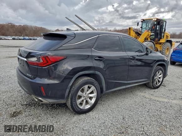 ✅ 2016 Lexus RX 350 • VIN: JTJBZMCAXG2003848 • Lot: 94152235. Listed on Copart with 152,187 mi. Free auction sales archive from the USA and detailed vehicle history report at DreamBid. Image 3.
