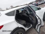 ✅ 2014 Hyundai Santa Fe • VIN: 5XYZTDLB5EG169256 • Lot: 43789898. Listed on IAAI with 204,836 mi. Free auction sales archive from the USA and detailed vehicle history report at DreamBid. Image 8.