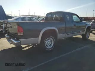 ✅ 1997 Dodge Dakota • VIN: 1B7GG23Y8VS303577 • Lot: 48778865. Wystawiony na Copart z przebiegiem 189 316 mil. Bezpłatny archiwum sprzedaży aukcyjnych z USA i szczegółowy raport historii pojazdu na DreamBid. Zdjęcie 3.