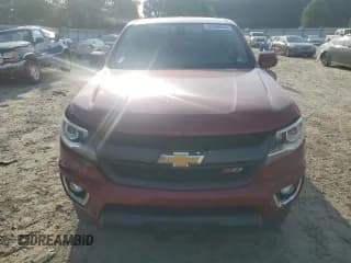 ✅ 2020 Chevrolet Colorado 4WD Z71 • VIN: 1GCGTDEN0L1200196 • Лот: 62996664. Опубликован ранее на Copart с пробегом 63 661 миль. Бесплатный доступ к архиву аукционных продаж из США и подробный отчёт об истории автомобиля на DreamBid. Изображение 5.