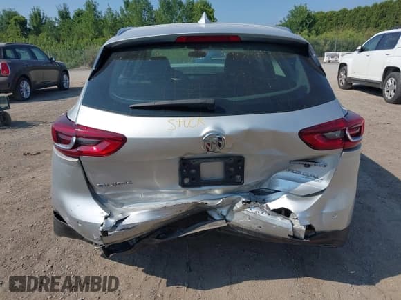 ✅ 2018 Buick Regal Essence • VIN: W04GV8SX0J1112828 • Lot: 42982845. Listed on IAAI with 112,400 mi. Free auction sales archive from the USA and detailed vehicle history report at DreamBid. Image 6.