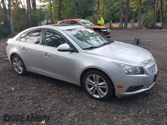 ✅ 2011 Chevrolet Cruze LTZ • VIN: 1G1PH5S94B7194213 • Лот: 43387084. Опубликован ранее на IAAI с пробегом 142 321 миль. Бесплатный доступ к архиву аукционных продаж из США и подробный отчёт об истории автомобиля на DreamBid. Изображение 1.