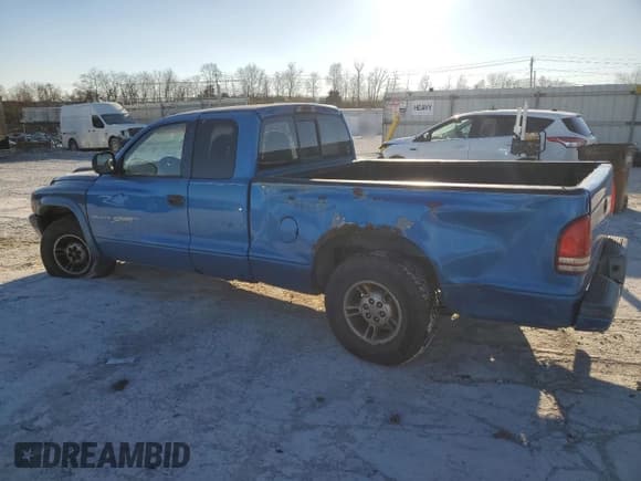 ✅ 1999 Dodge Dakota SLT • VIN: 1B7GL22X5XS321879 • Lot: 84015834. Wystawiony na Copart z przebiegiem 210 252 mil. Bezpłatny archiwum sprzedaży aukcyjnych z USA i szczegółowy raport historii pojazdu na DreamBid. Zdjęcie 2.