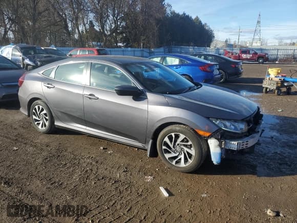 ✅ 2018 Honda Civic LX • VIN: 2HGFC2F64JH028410 • Лот: 93200165. Опубликован ранее на Copart с пробегом 113 958 миль. Бесплатный доступ к архиву аукционных продаж из США и подробный отчёт об истории автомобиля на DreamBid. Изображение 4.