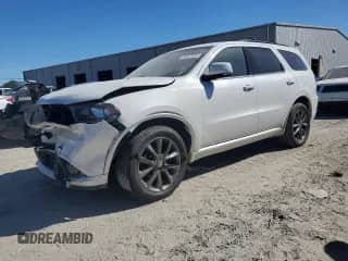 2018 Dodge Durango GT with VIN 1C4RDJDG2JC161619, listed as a Copart auction lot 86687465 with 148,892 mi miles and Salvage title. Bid and sale history available at DreamBid. Image 1.