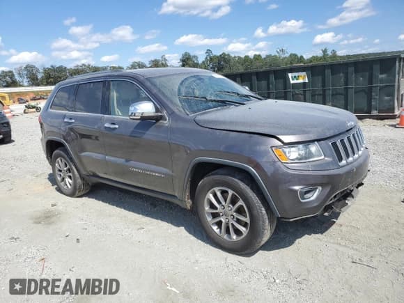 ✅ 2015 Jeep Grand Cherokee Limited • VIN: 1C4RJEBGXFC737211 • Lot: 70911715. Listed on Copart with 243,640 mi. Free auction sales archive from the USA and detailed vehicle history report at DreamBid. Image 4.